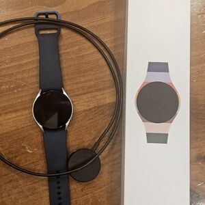 Samsung Black Smartwatch with Circular Display and Modern Design